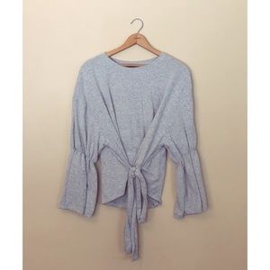 Cute gray sweater with bell sleeves!